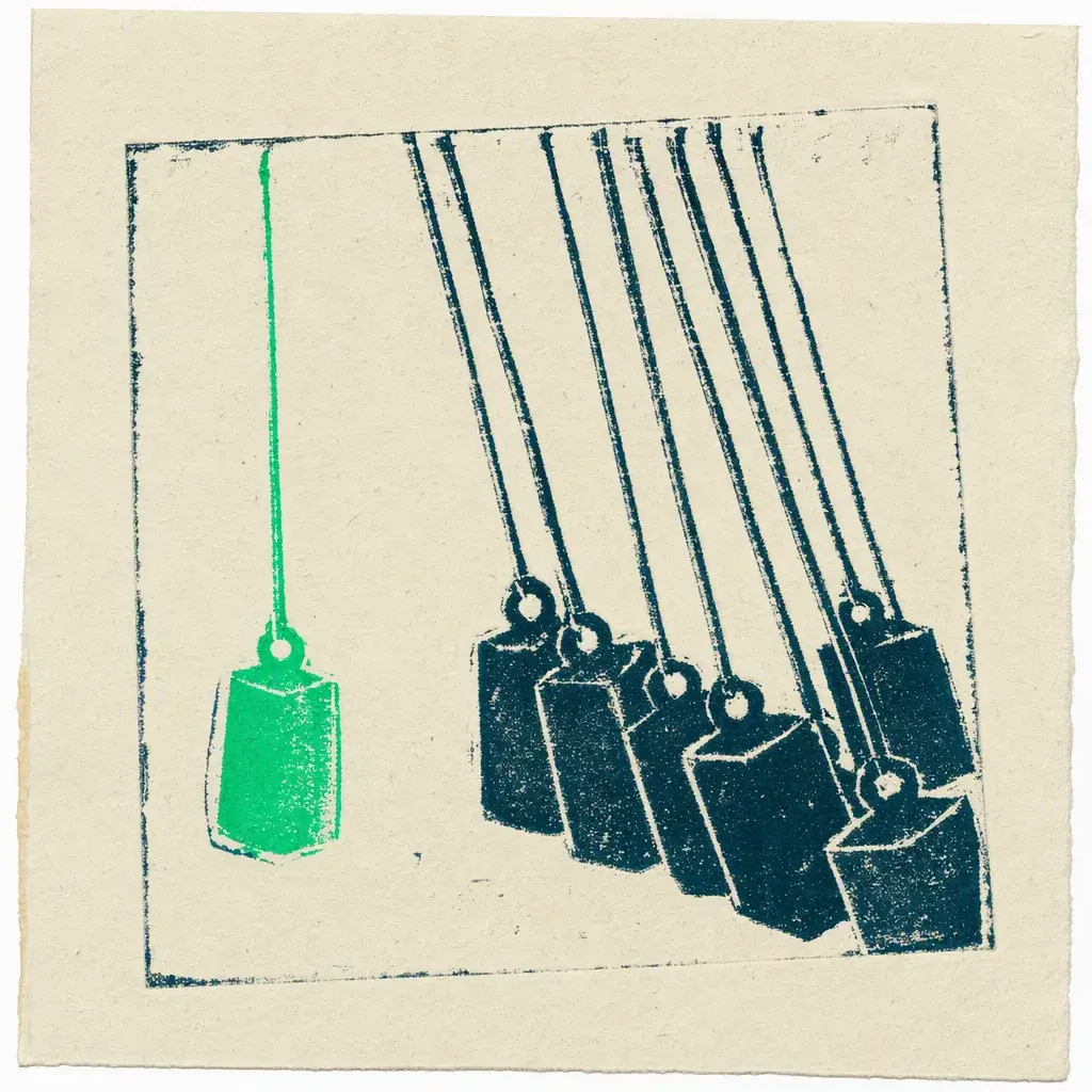 Pendulums, a Reality Transurfing concept: Carved hanging weights, most swung together, one printed green and still